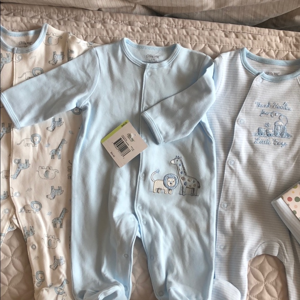 Bundle of baby boy footed sleepers
